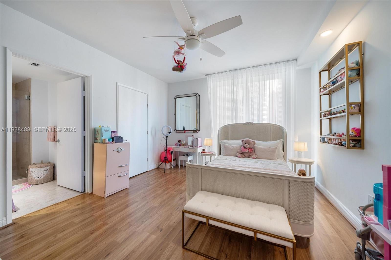 799 Crandon Boulevard, Unit 908 Key Biscayne, FL 33149 - Photo 25 of 30 a living room with furniture and a large window