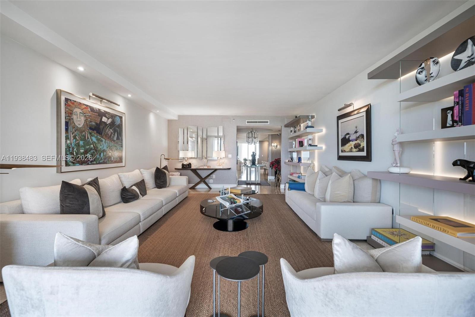 799 Crandon Boulevard, Unit 908 Key Biscayne, FL 33149 - Photo 4 of 30 a living room with furniture rug and window