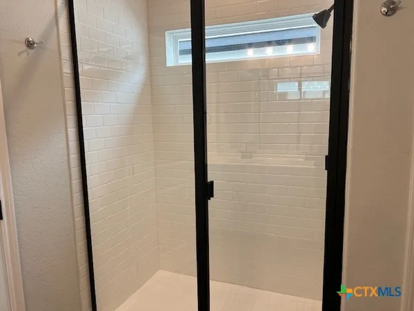 a house that has a big yard in front of it