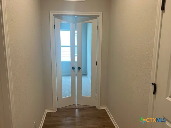 an empty room with window