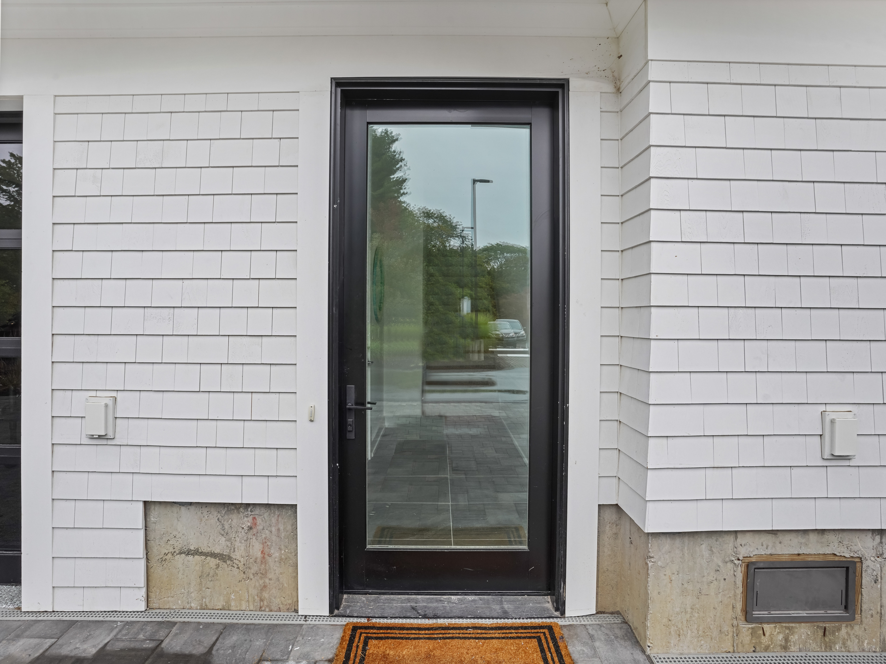 345 Reef Road, Unit C9 Fairfield, CT 06824 - Photo 8 of 39 a view of entrance door of the house