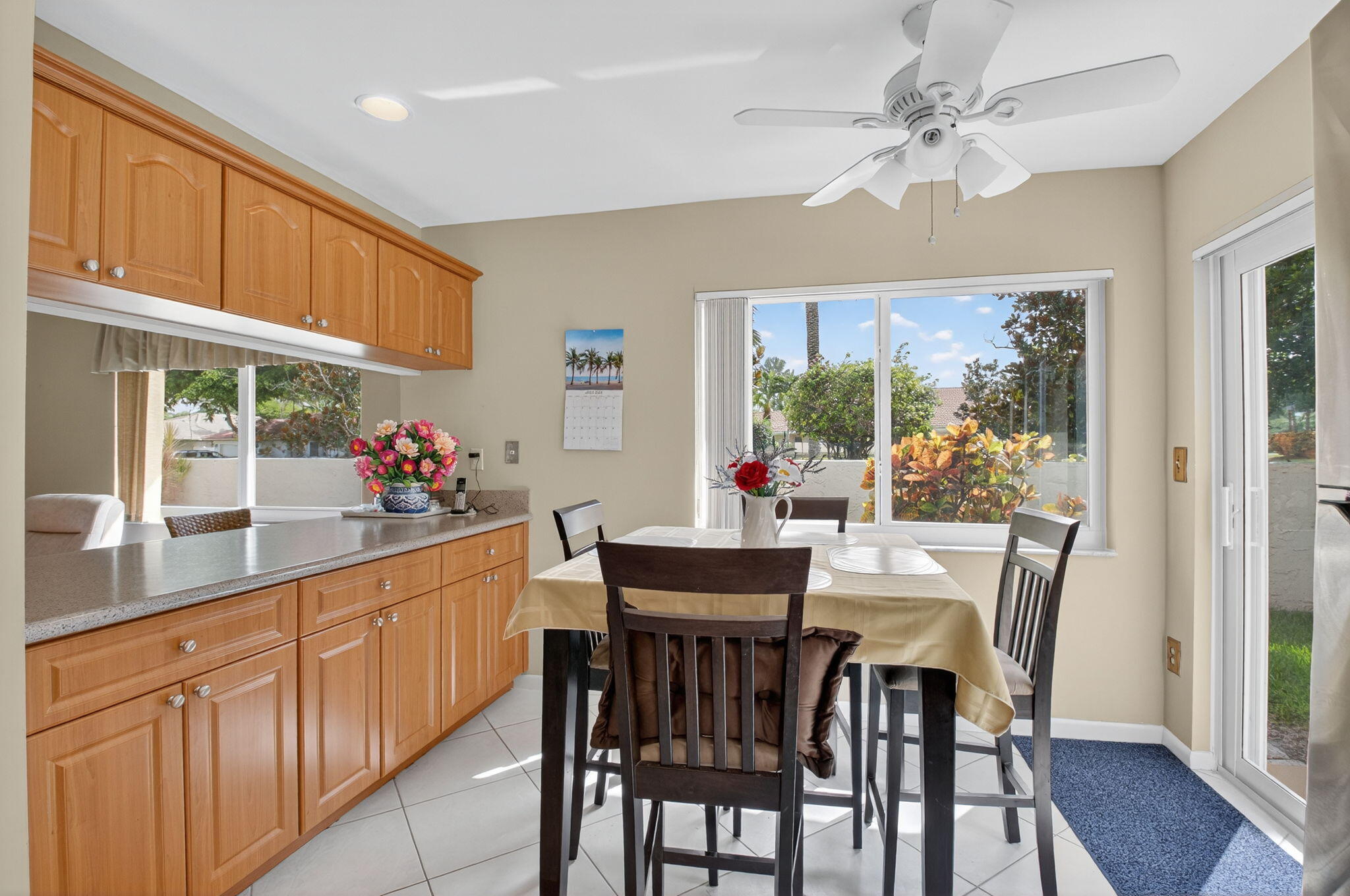 6290 Sweet Maple Lane Boca Raton, FL 33433 - Photo 13 of 35 a view of a dining room with furniture window and wooden floor