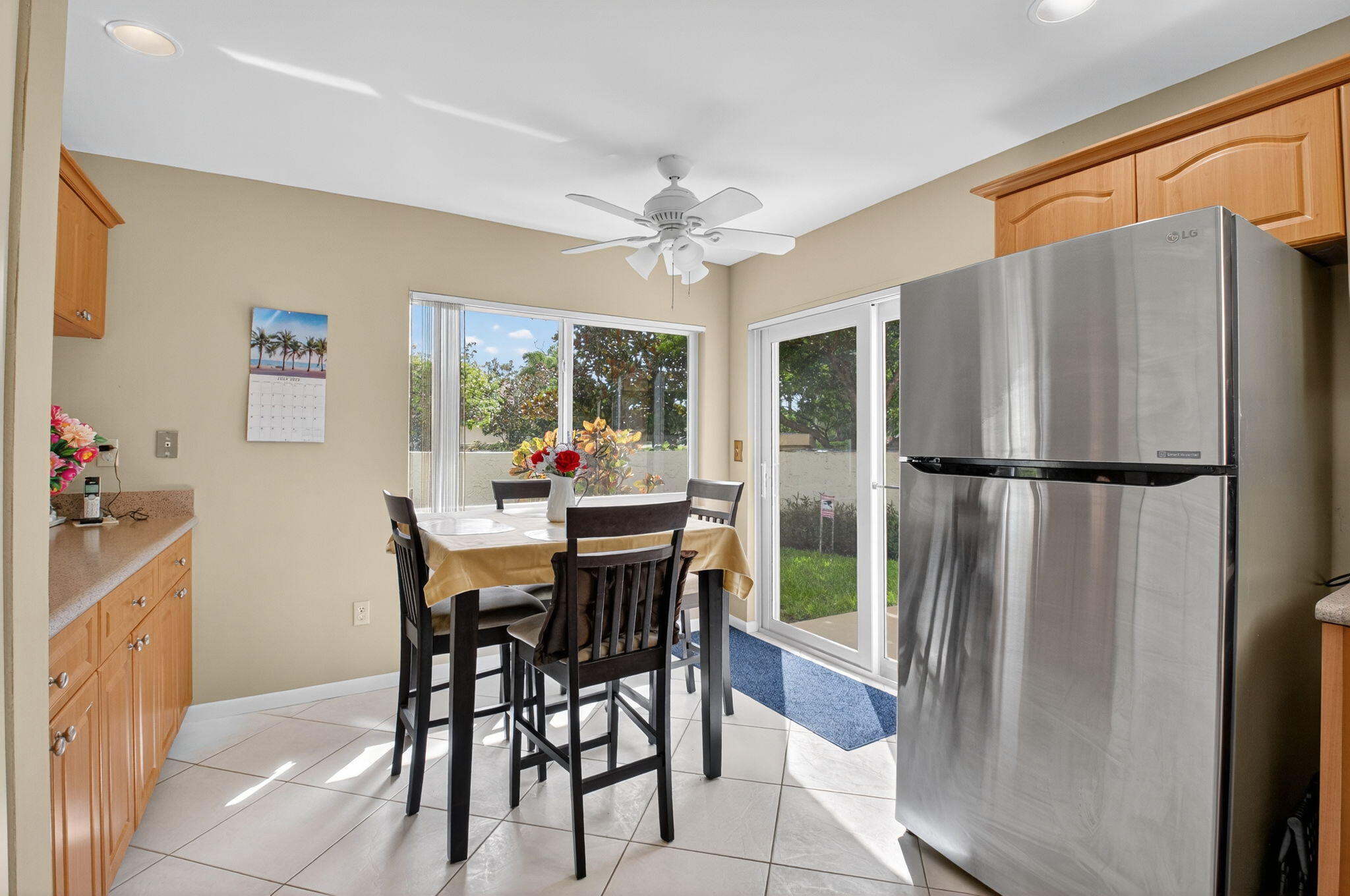 6290 Sweet Maple Lane Boca Raton, FL 33433 - Photo 14 of 35 a view of a dining room with furniture window and wooden floor