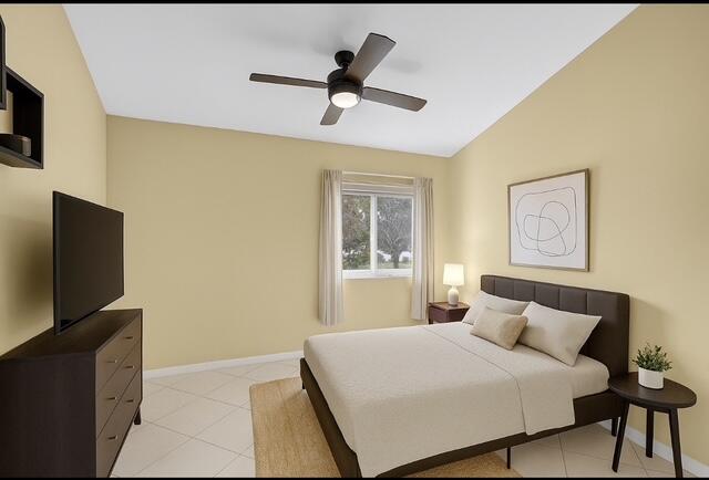 6290 Sweet Maple Lane Boca Raton, FL 33433 - Photo 22 of 35 a bedroom with a bed and a flat screen tv