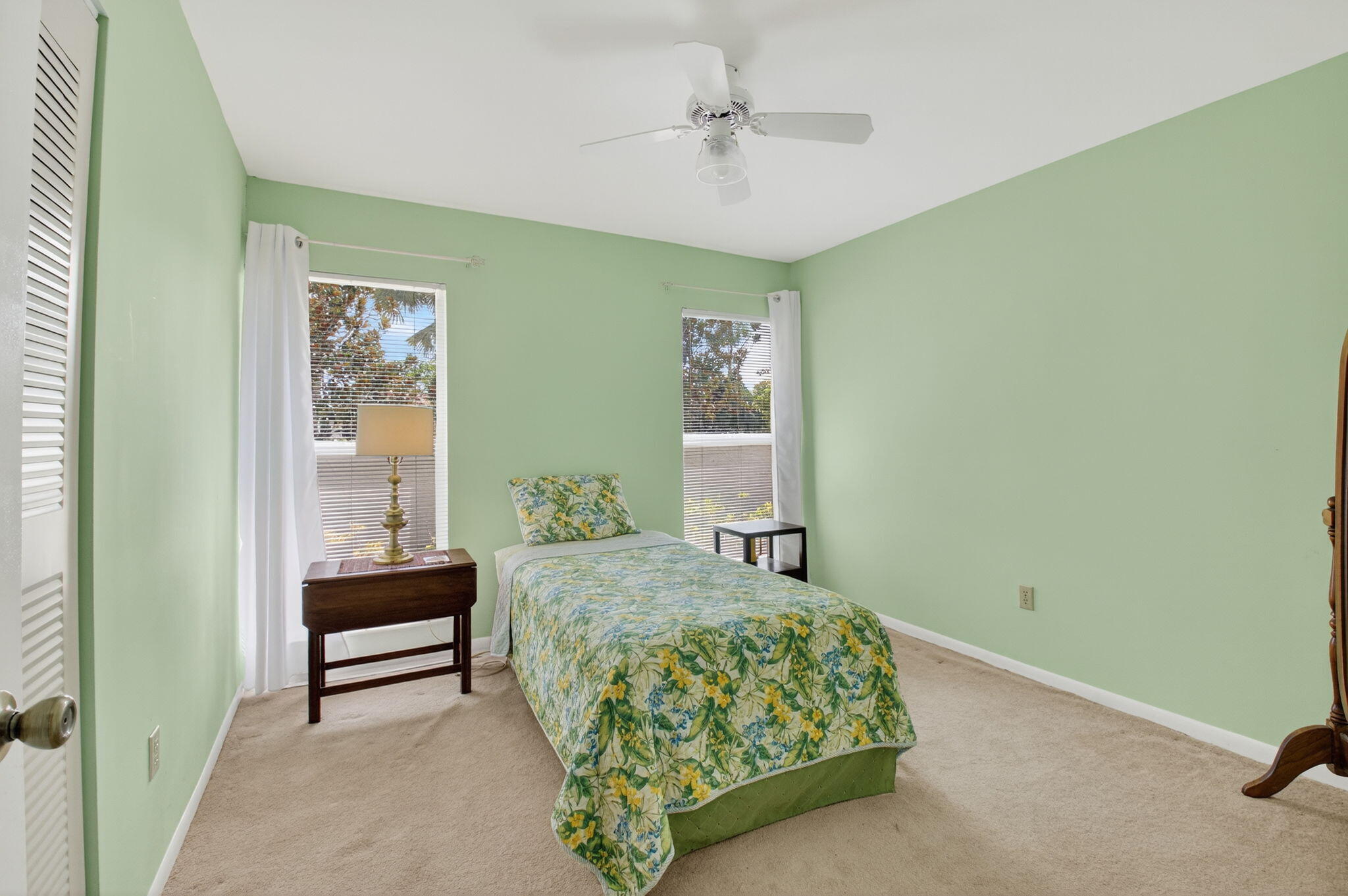 6290 Sweet Maple Lane Boca Raton, FL 33433 - Photo 23 of 35 a bedroom with a bed and a chandelier