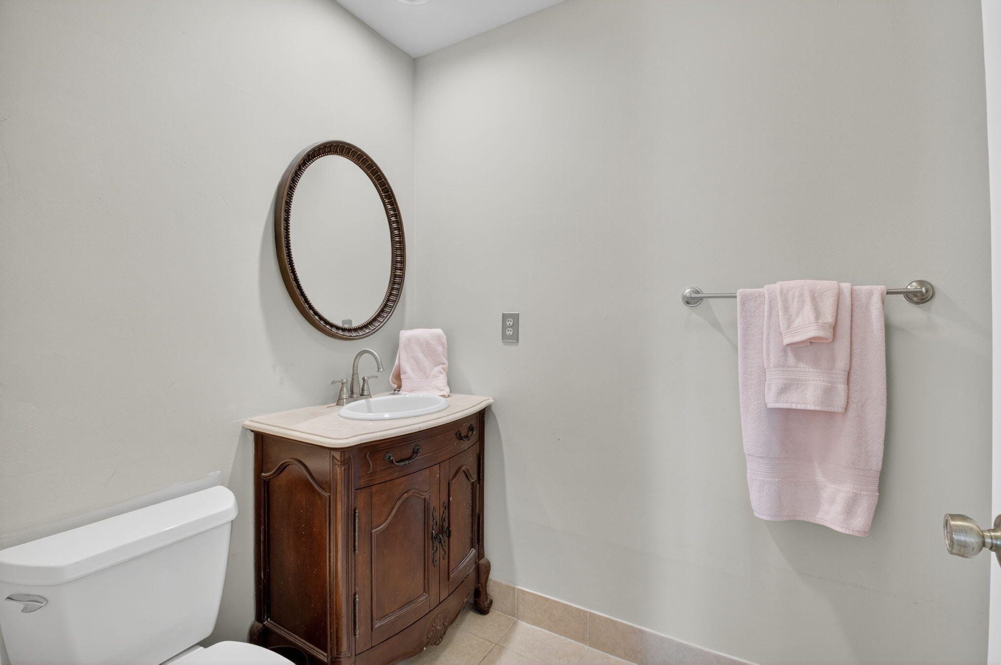 6290 Sweet Maple Lane Boca Raton, FL 33433 - Photo 24 of 35 a bathroom with a sink a toilet and a mirror