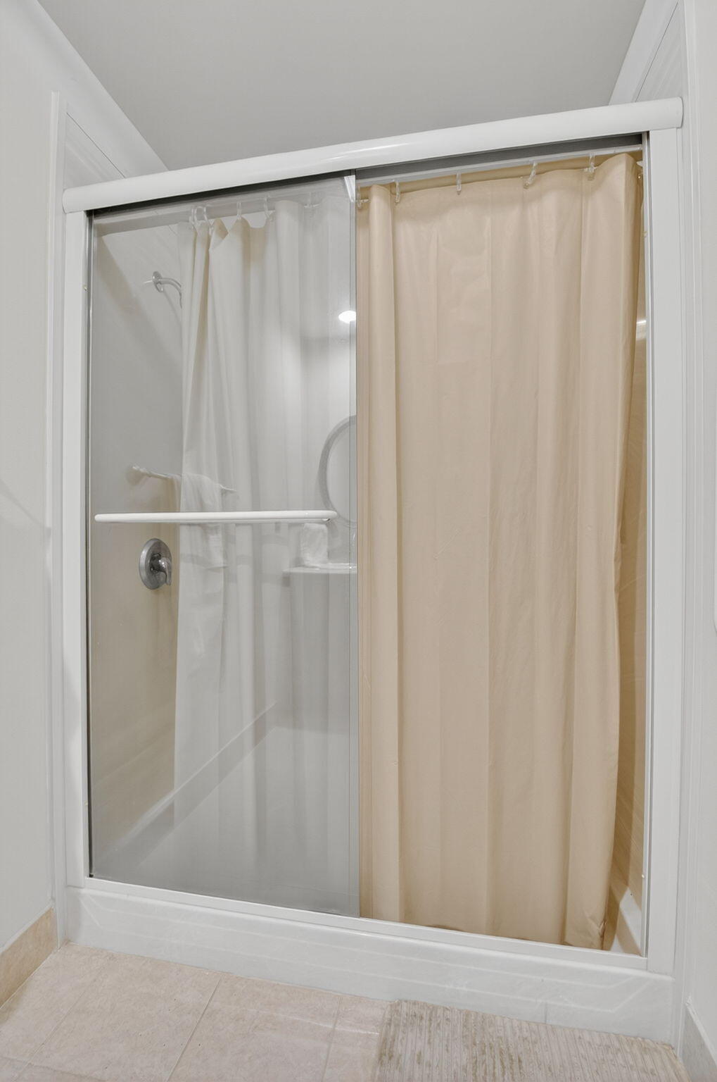6290 Sweet Maple Lane Boca Raton, FL 33433 - Photo 25 of 35 a bathroom with a shower and a window