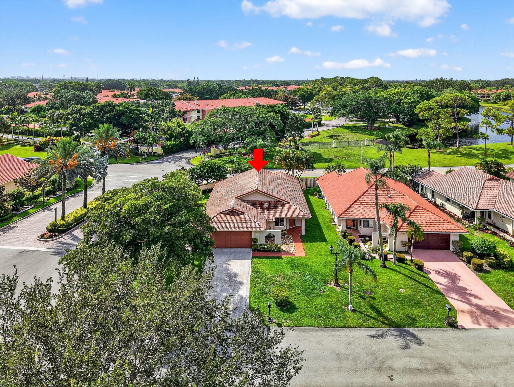 6290 Sweet Maple Lane Boca Raton, FL 33433 - Photo 32 of 35 an aerial view of a house with a yard and lake view
