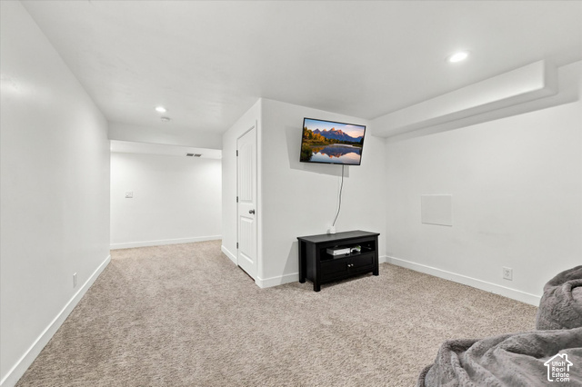 972 Vine Street Mapleton, UT 84664 - Photo 28 of 40 Carpeted room with recessed lighting and a white paneled door