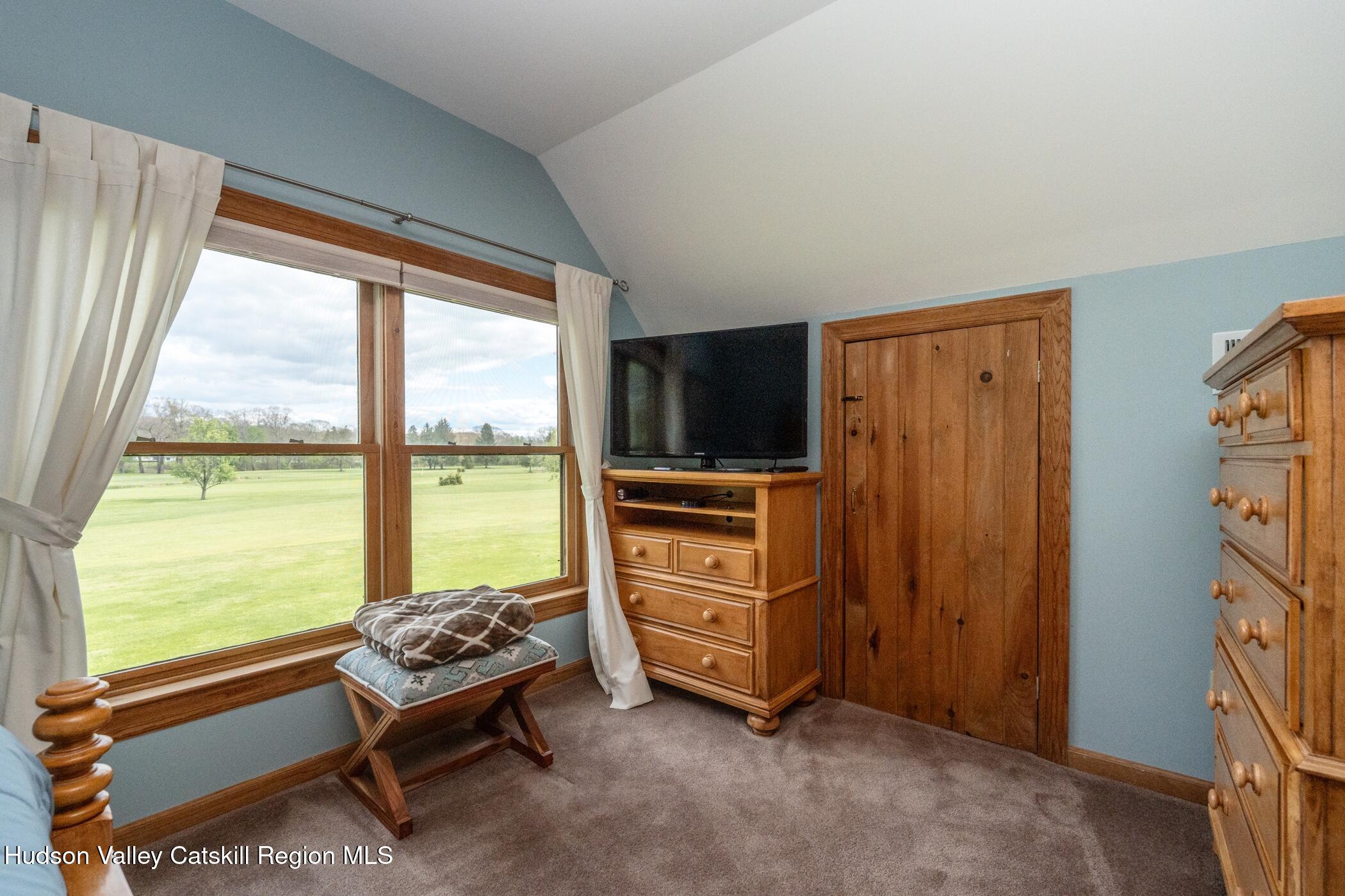 140 Stone Dock Road High Falls, NY 12440 - Photo 24 of 42 a room with furniture and a flat screen tv