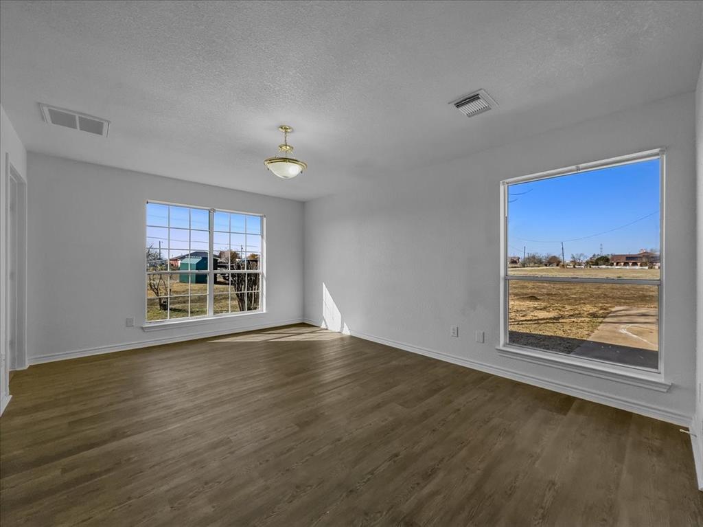 1101 Savanh Street Venus, TX 76084 - Photo 16 of 29 Primary Bedroom with en suite