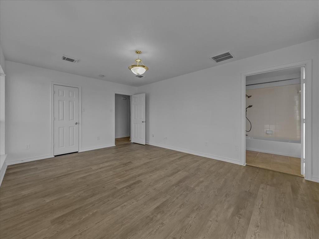 1101 Savanh Street Venus, TX 76084 - Photo 17 of 29 Primary Bedroom with en suite