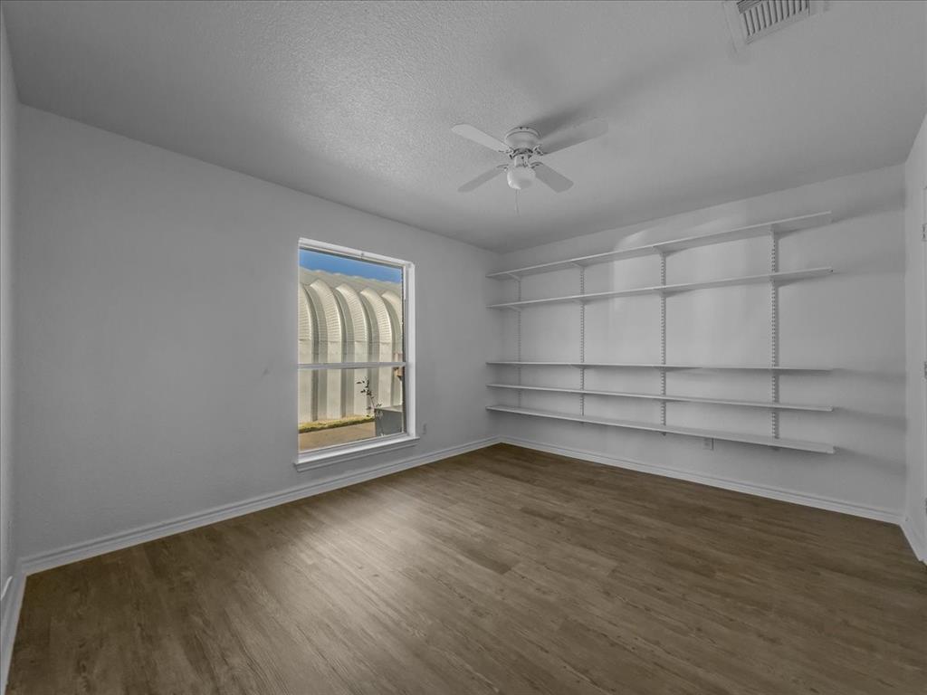 1101 Savanh Street Venus, TX 76084 - Photo 21 of 29 Guest Bedroom with built-in shelves