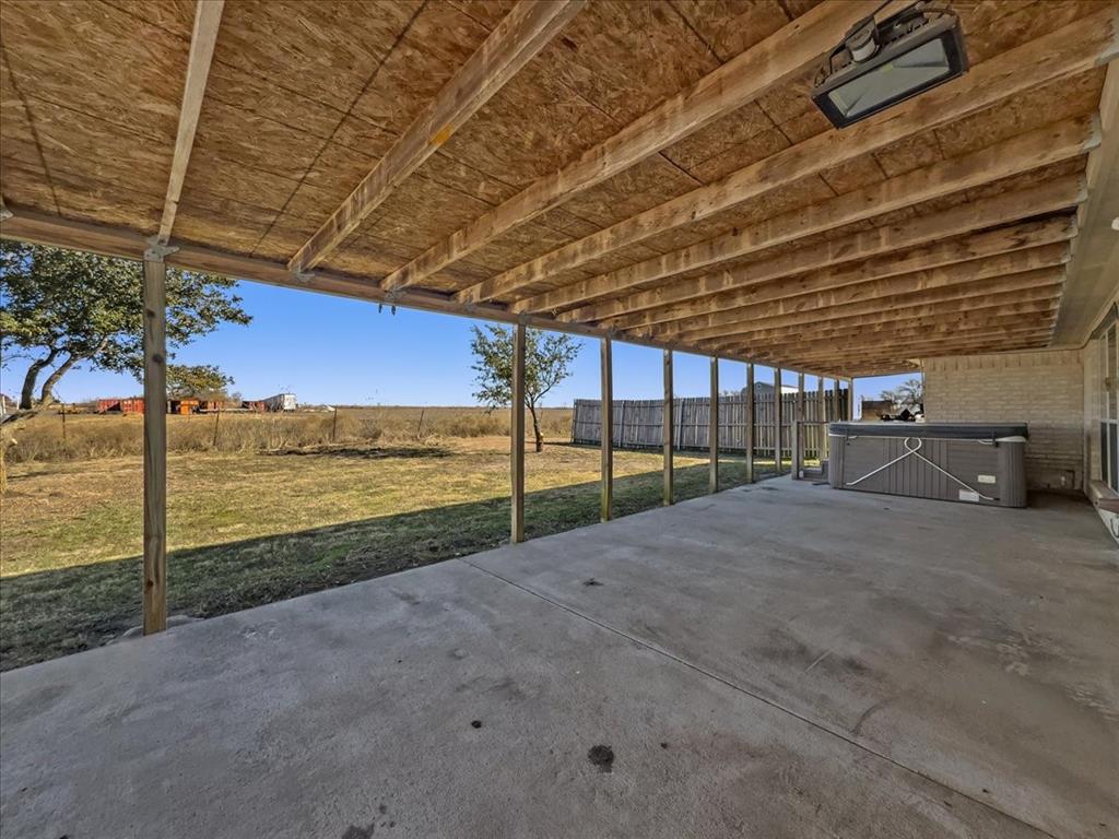 1101 Savanh Street Venus, TX 76084 - Photo 26 of 29 Back porch with hot tub