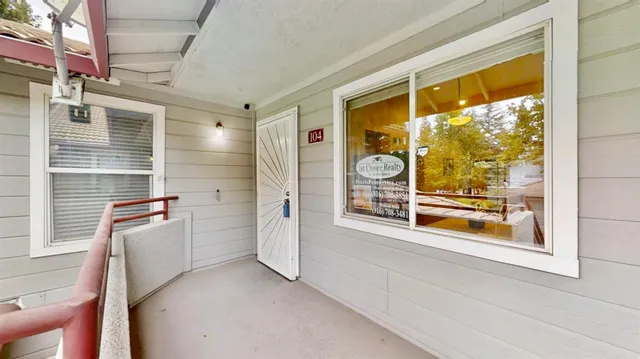 a view of empty room with windows