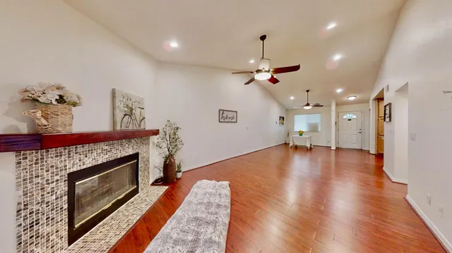 a bathroom with a double vanity sink mirror and shower