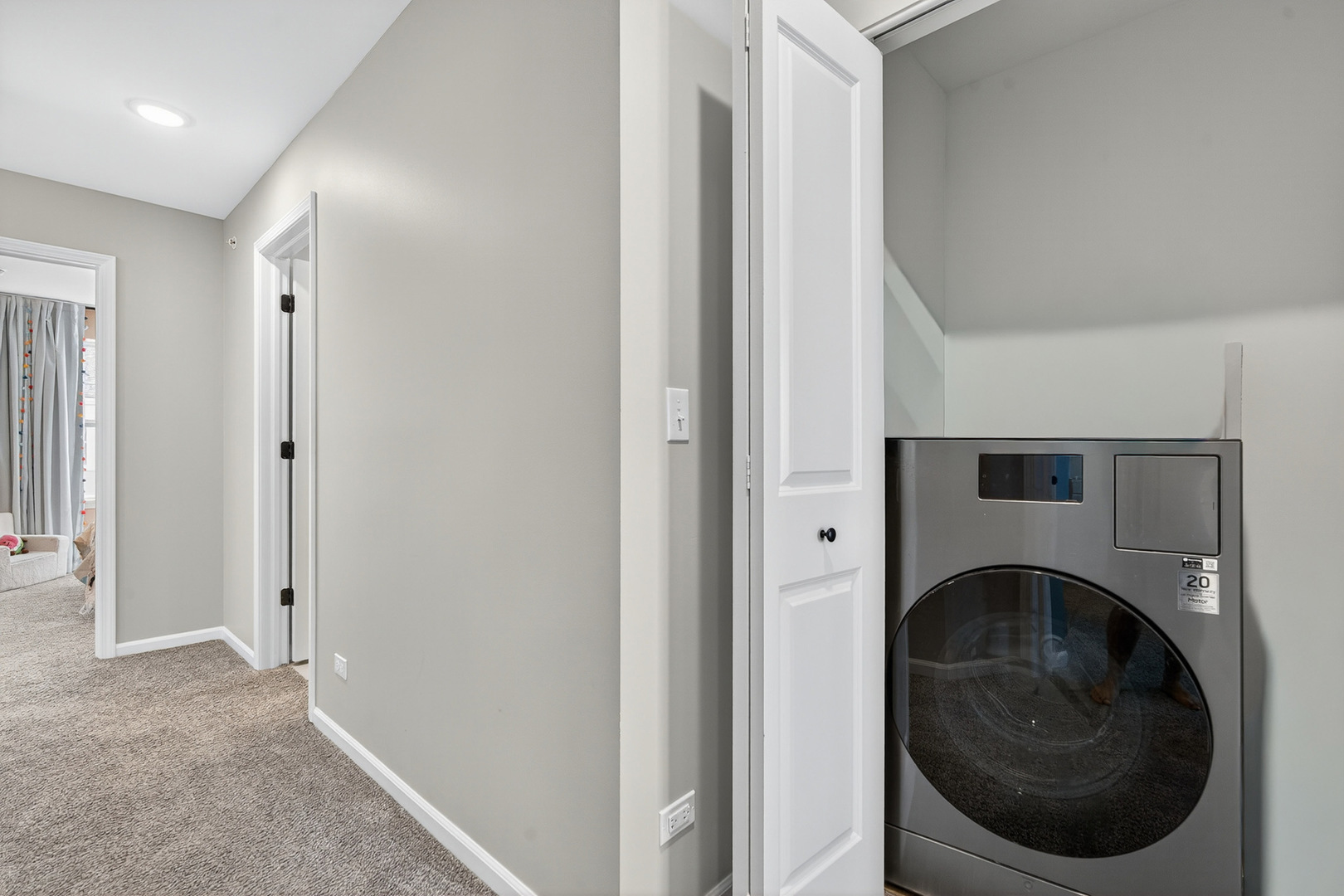 30-w136 Wheeler Circle Aurora, IL 60502 - Photo 17 of 23 a view of a hallway with washer and dryer