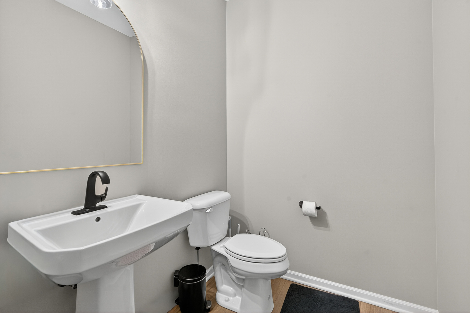 30-w136 Wheeler Circle Aurora, IL 60502 - Photo 10 of 23 a bathroom with a sink a toilet and mirror