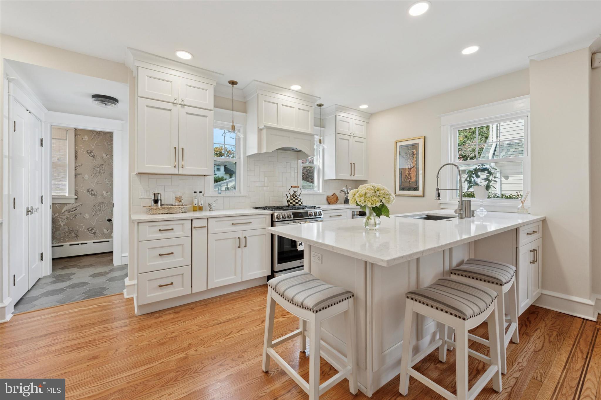 2918 Rising Sun Road Ardmore, PA 19003 - Photo 13 of 33 a kitchen with a sink cabinets and wooden floor