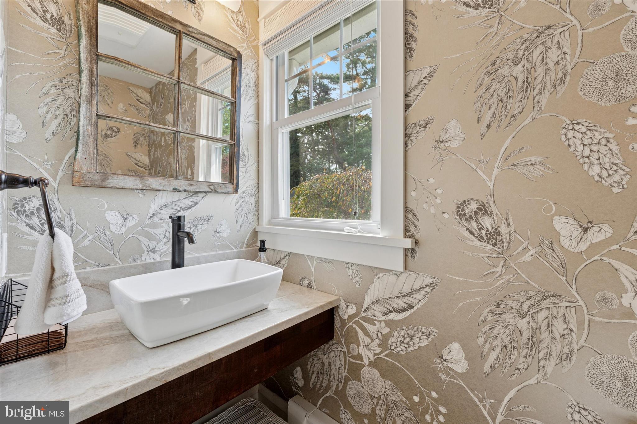 2918 Rising Sun Road Ardmore, PA 19003 - Photo 16 of 33 a bathroom with a bathtub and next to a window