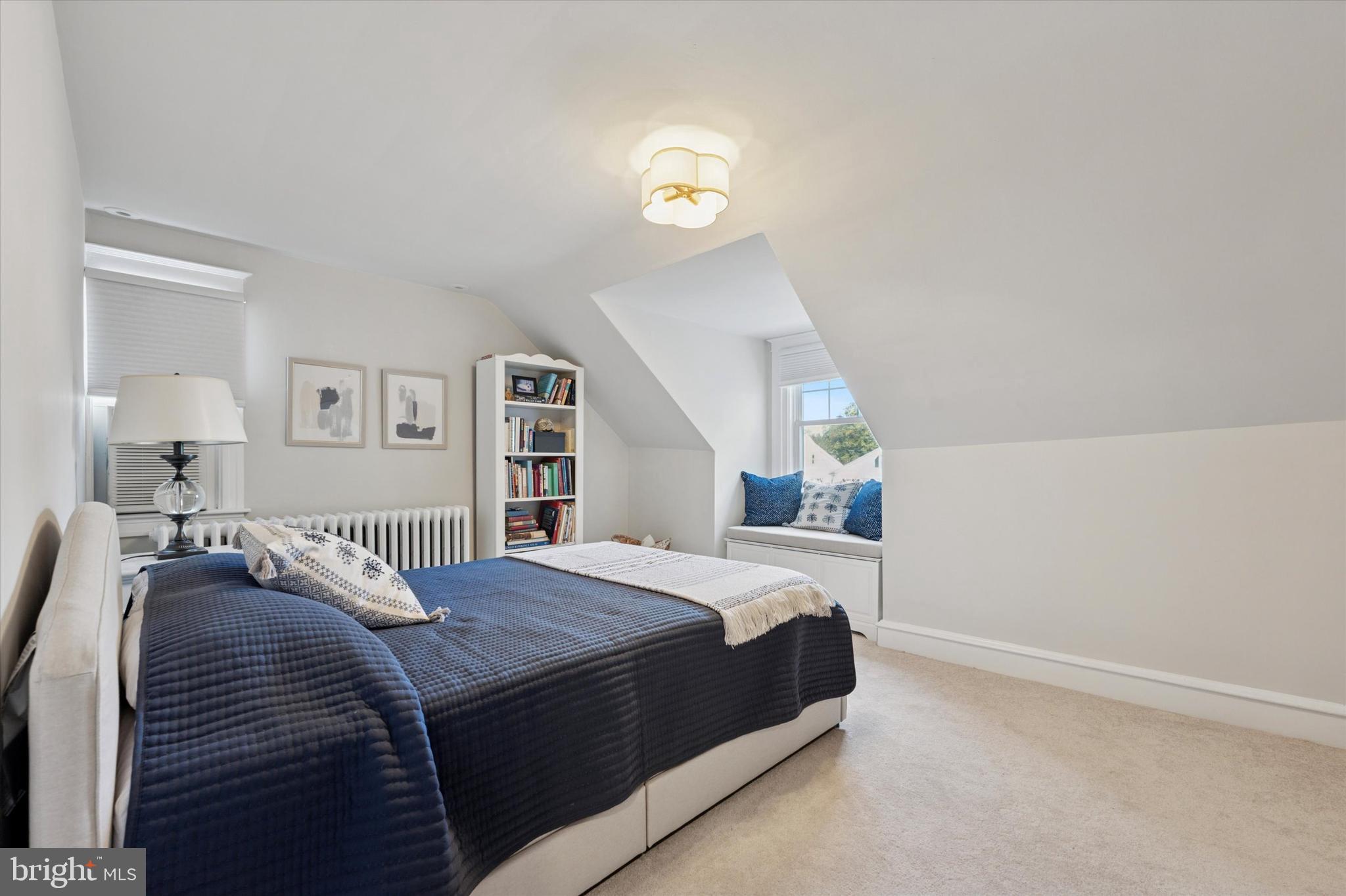 2918 Rising Sun Road Ardmore, PA 19003 - Photo 29 of 33 a bedroom with a bed and a lamp