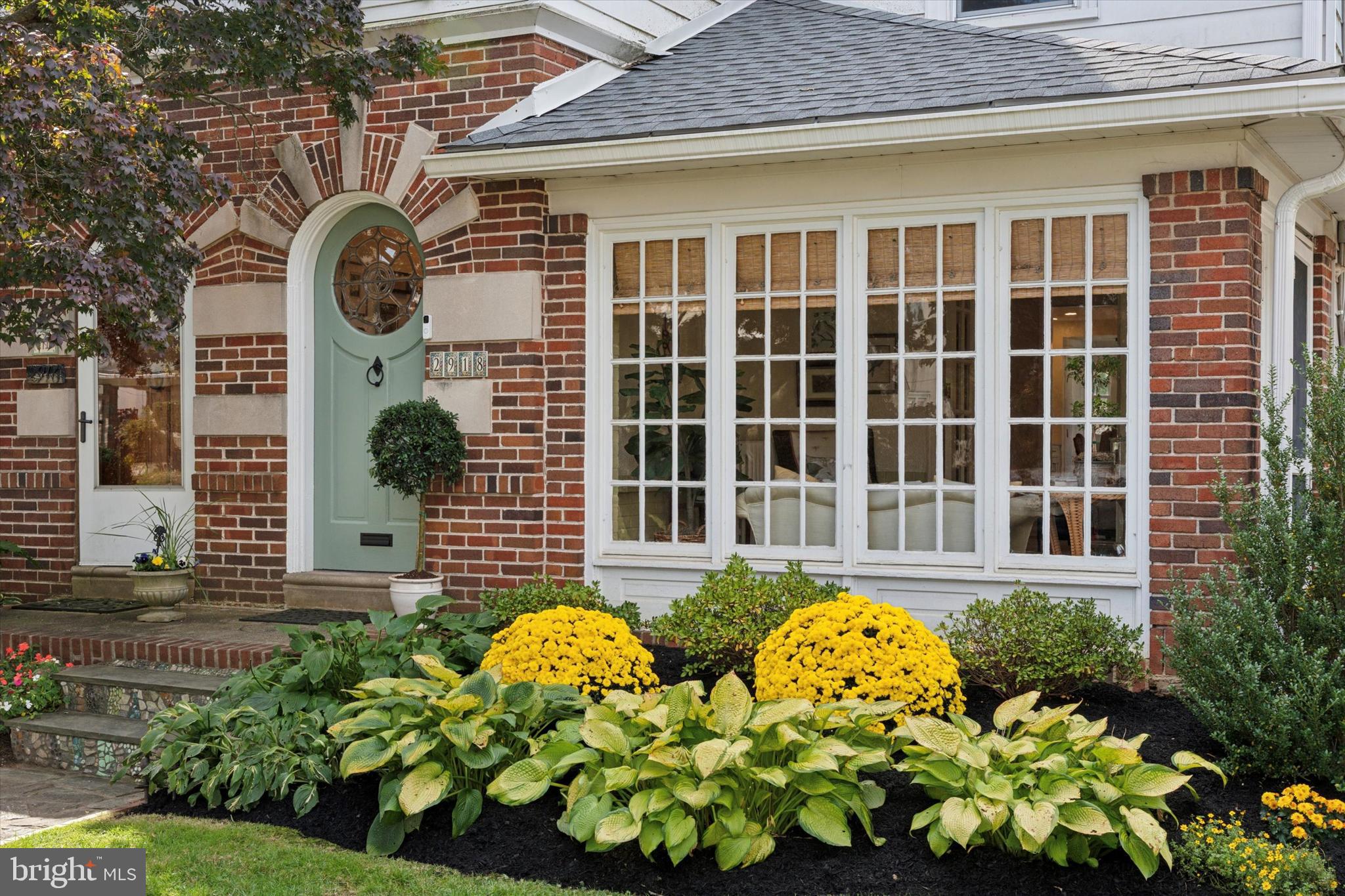 2918 Rising Sun Road Ardmore, PA 19003 - Photo 33 of 33 a front view of a house with a garden