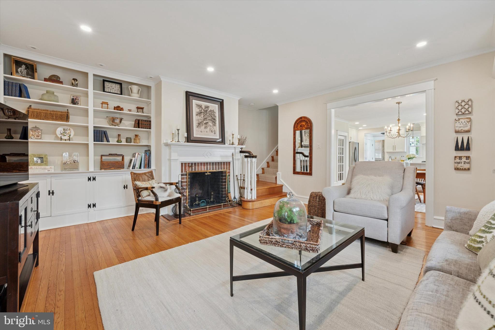 2918 Rising Sun Road Ardmore, PA 19003 - Photo 6 of 33 a living room with furniture a rug and a fireplace
