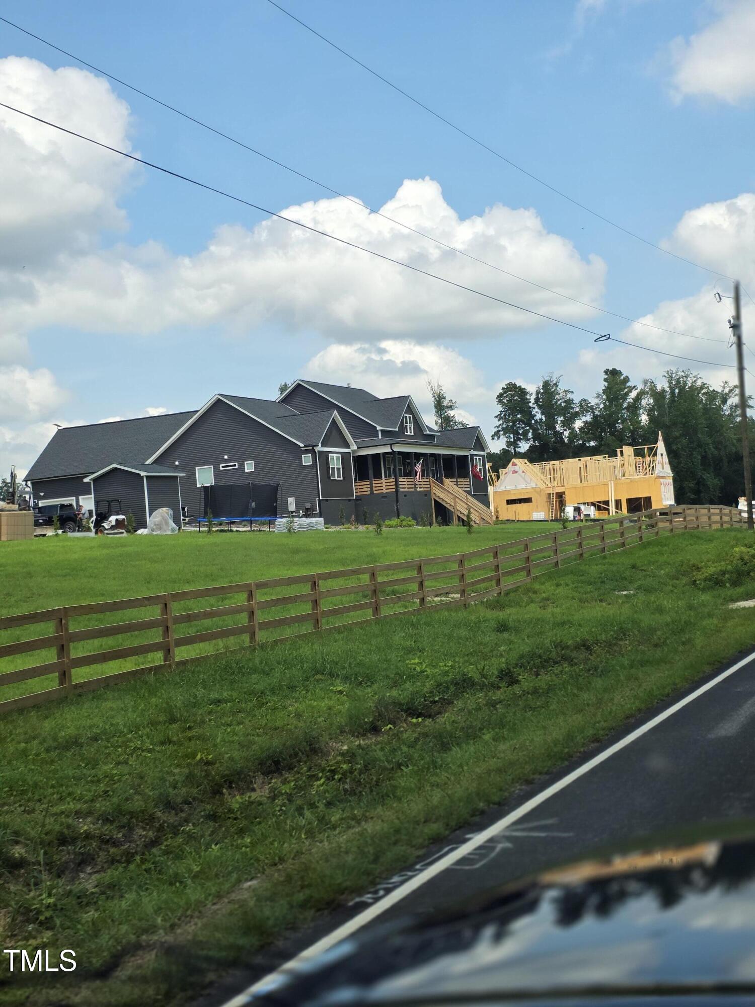 0 Dukes Lake Road Zebulon, NC 27597 - Photo 9 of 11 a view of a golf course with a garden