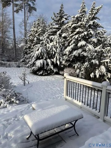 a view of balcony with wooden floor