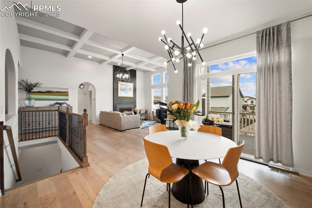 4661 Horse Gulch Loop Colorado Springs, CO 80924 - Photo 18 of 48 a view of a dining room with furniture window and outside view