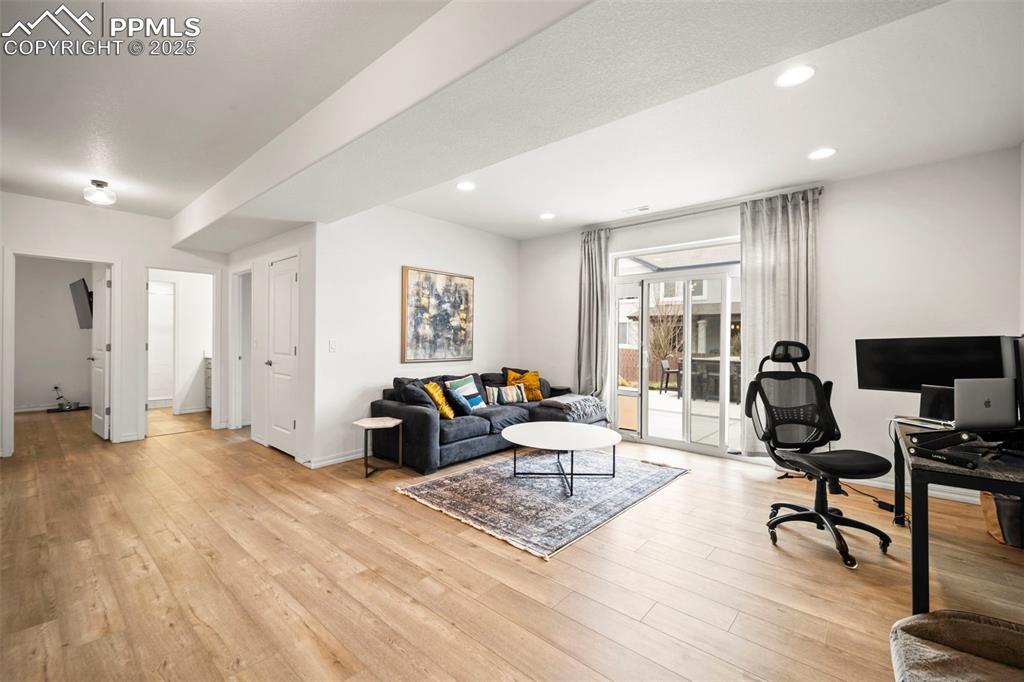 4661 Horse Gulch Loop Colorado Springs, CO 80924 - Photo 23 of 48 a living room with furniture
