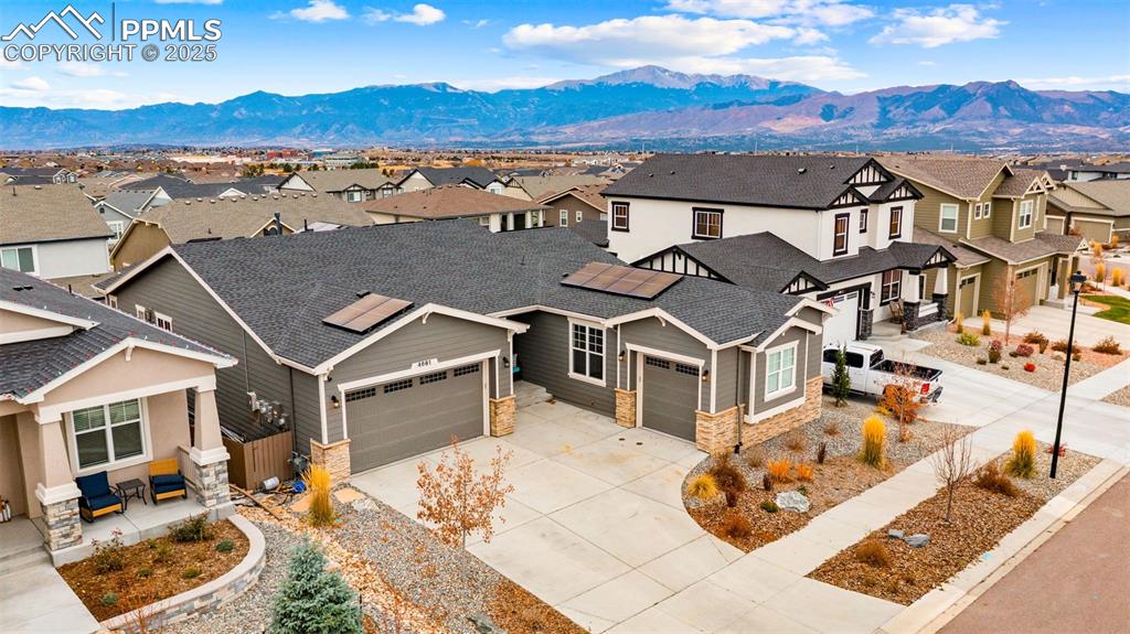 4661 Horse Gulch Loop Colorado Springs, CO 80924 - Photo 39 of 48 an aerial view of a house with a yard