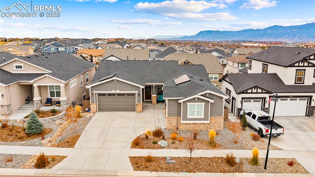 4661 Horse Gulch Loop Colorado Springs, CO 80924 - Photo 40 of 48 an aerial view of a house with a yard