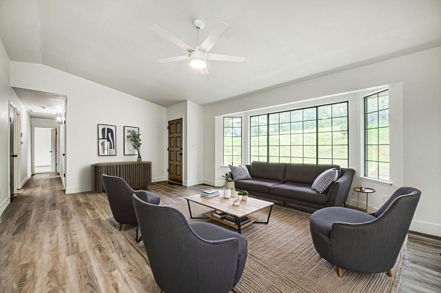 42741 Revis Way Coarsegold, CA 93614 - Photo 3 of 17 a living room with furniture and a large window