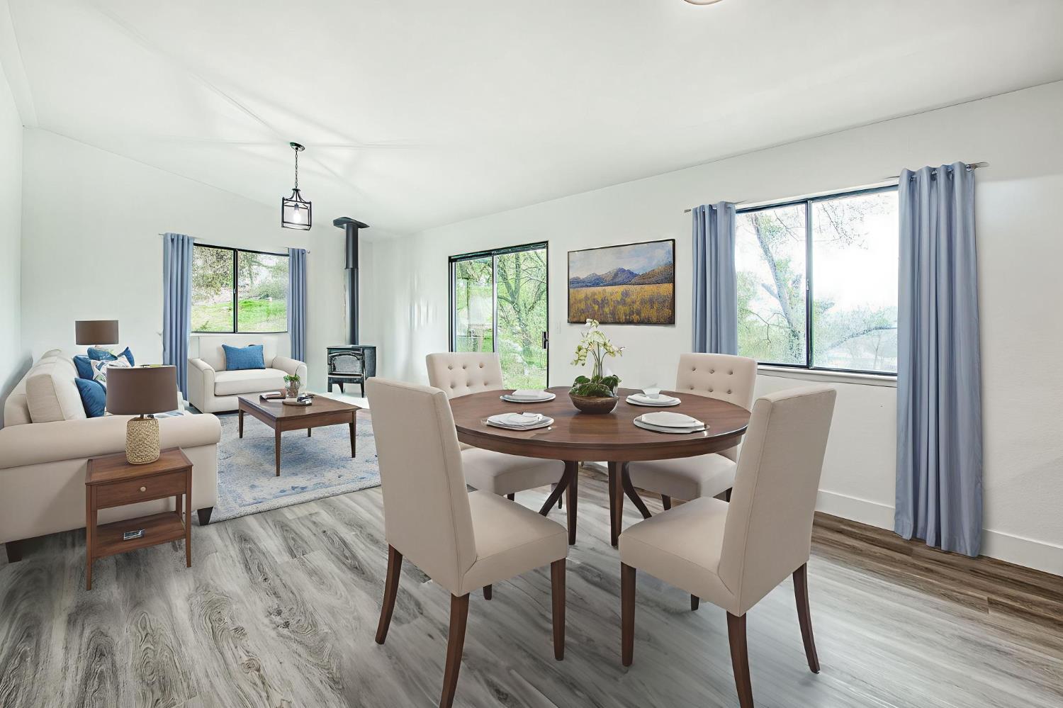 42741 Revis Way Coarsegold, CA 93614 - Photo 5 of 17 a view of a dining room with furniture window and wooden floor