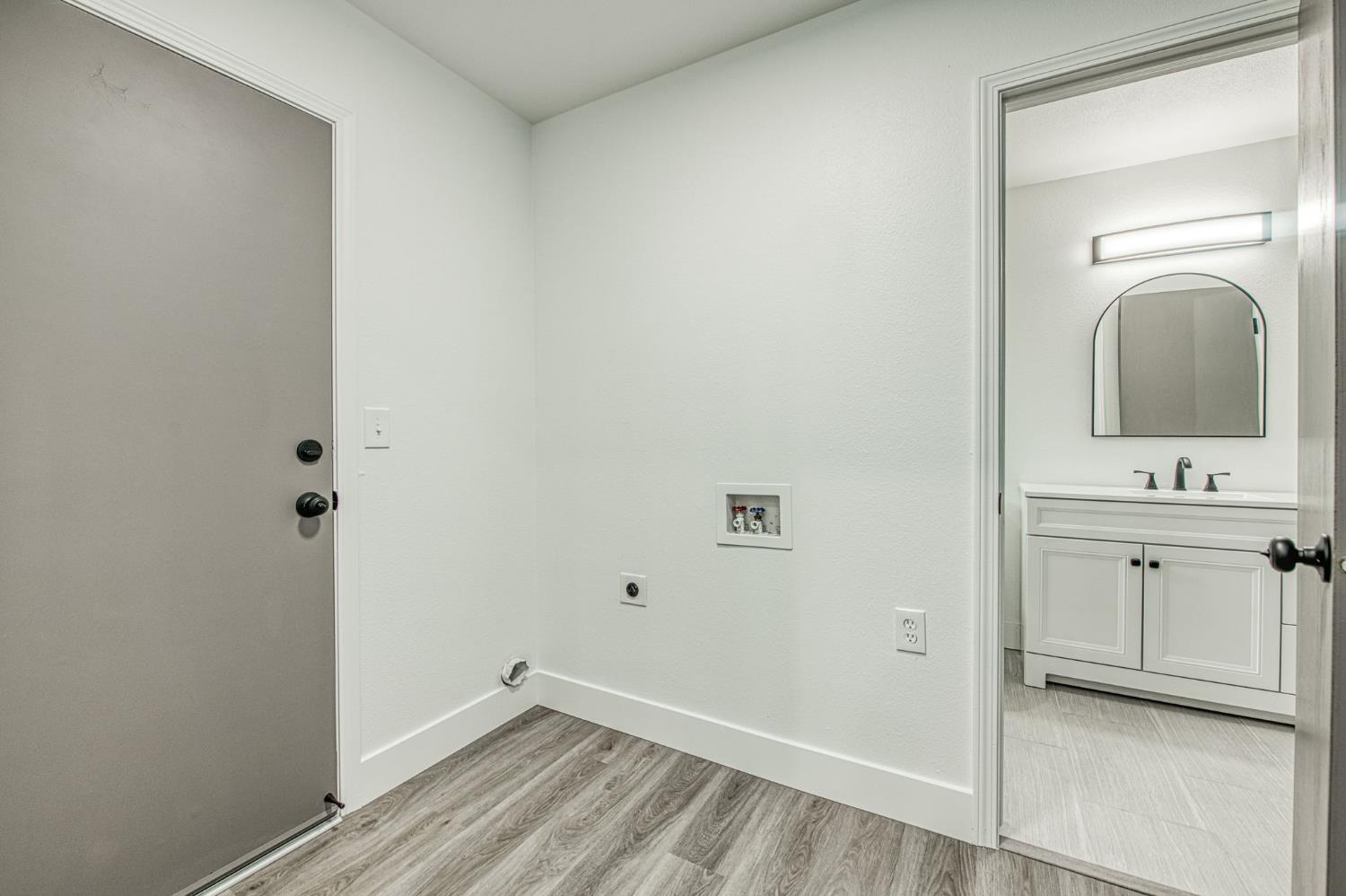 42741 Revis Way Coarsegold, CA 93614 - Photo 9 of 17 a bathroom with a sink a toilet and a mirror