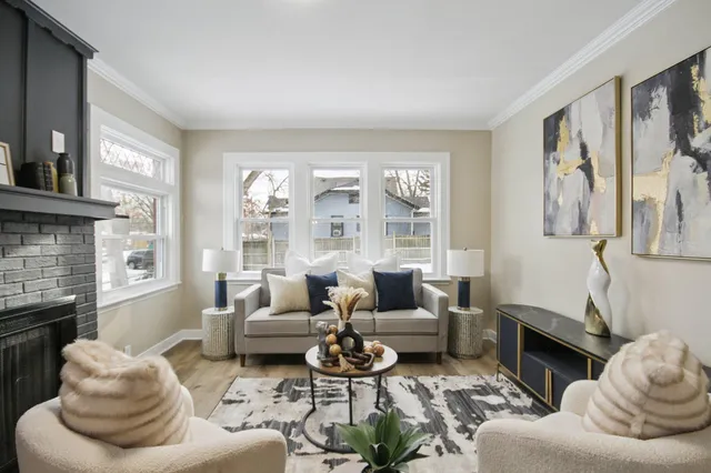 a living room with furniture or couch and a fireplace