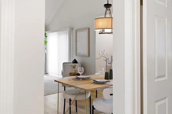 a view of a workspace room with wooden floor