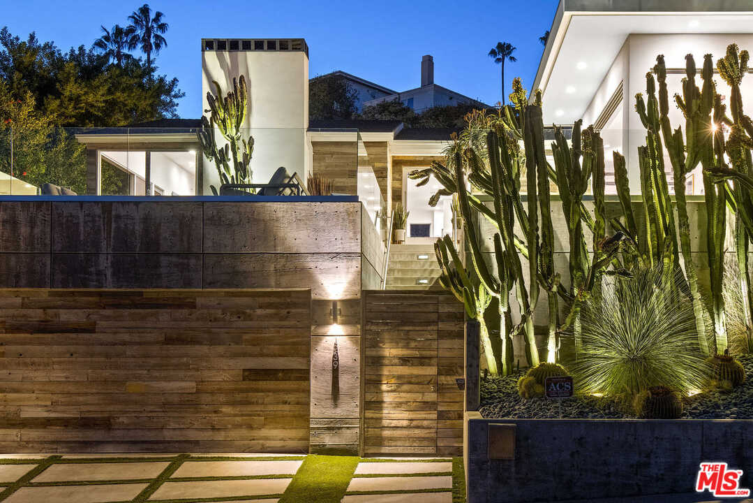 1239 Las Pulgas Road Pacific Palisades, CA 90272 - Photo 1 of 54 a view of a house with a door