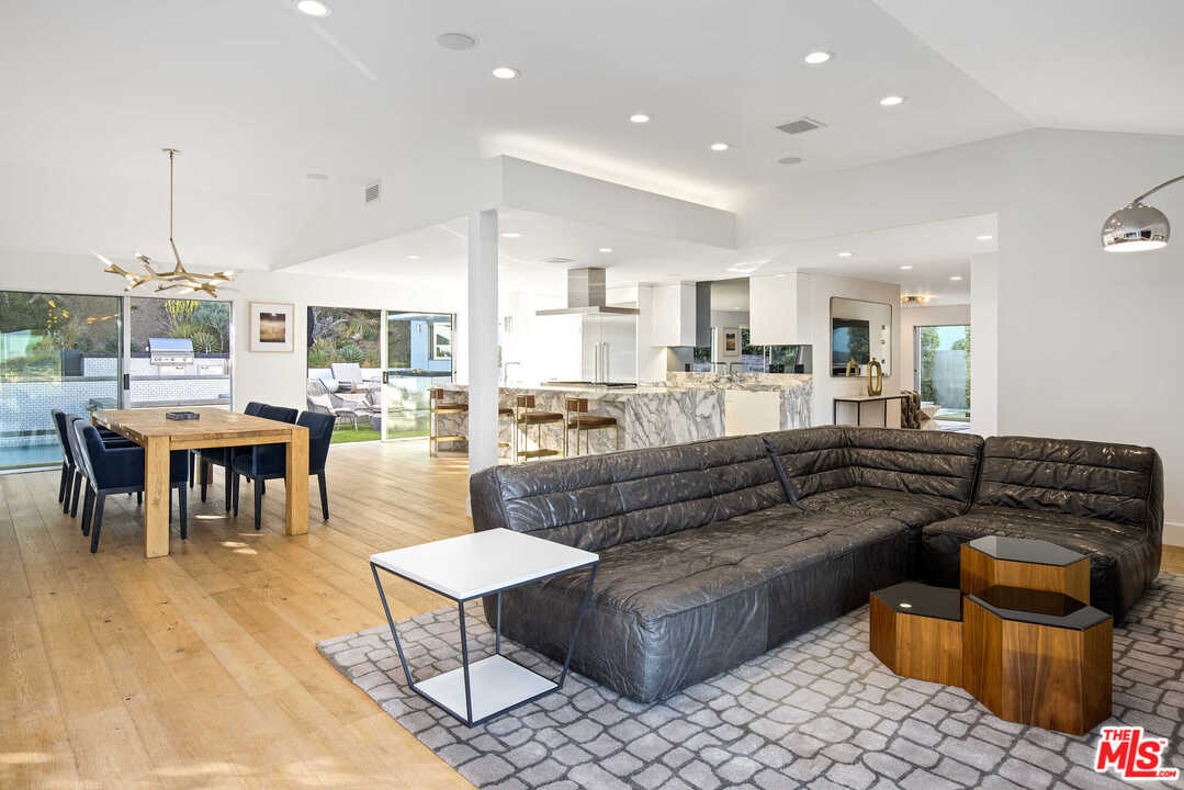 1239 Las Pulgas Road Pacific Palisades, CA 90272 - Photo 17 of 54 a living room with stainless steel appliances furniture and a kitchen view