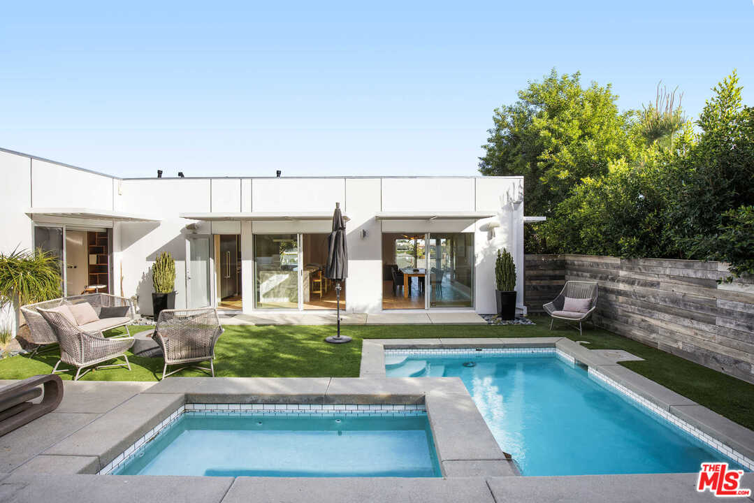 1239 Las Pulgas Road Pacific Palisades, CA 90272 - Photo 39 of 54 a view of a house with sitting area