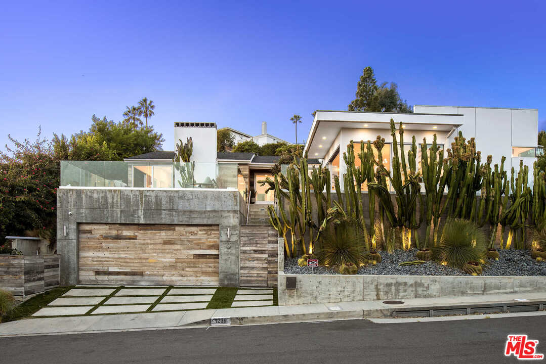 1239 Las Pulgas Road Pacific Palisades, CA 90272 - Photo 41 of 54 a view of a house with a street