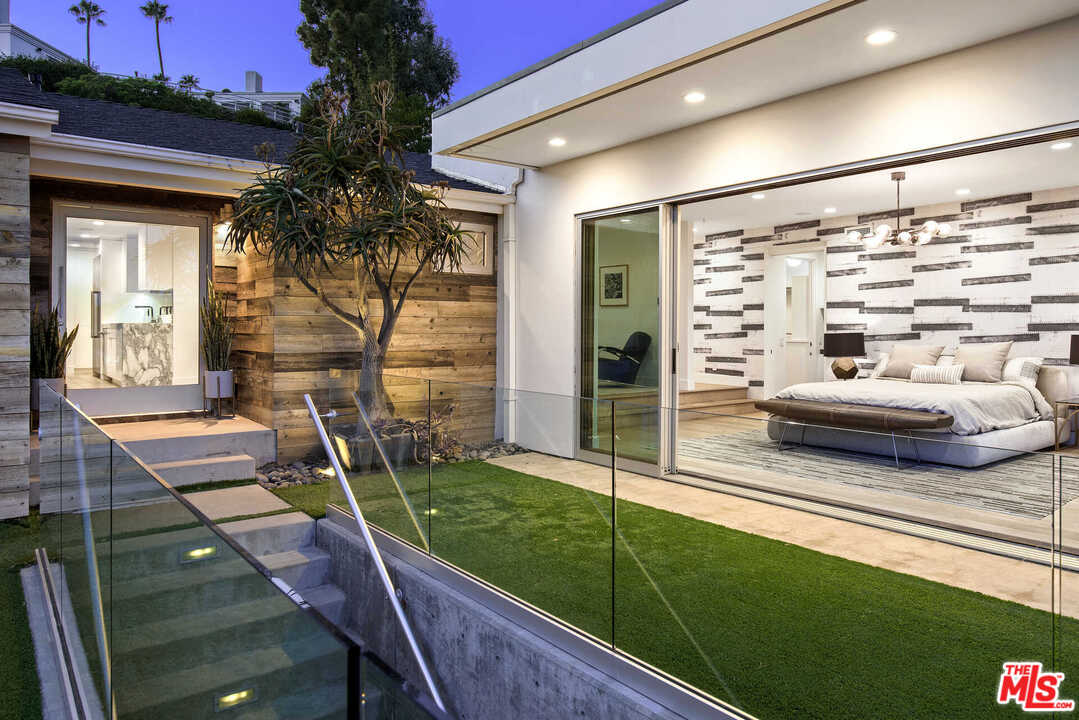 1239 Las Pulgas Road Pacific Palisades, CA 90272 - Photo 46 of 54 a balcony with view of swimming pool