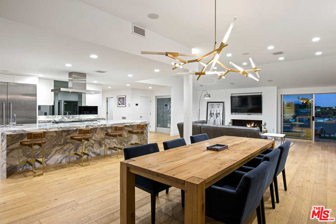 1239 Las Pulgas Road Pacific Palisades, CA 90272 - Photo 49 of 54 a view of a dining room with furniture