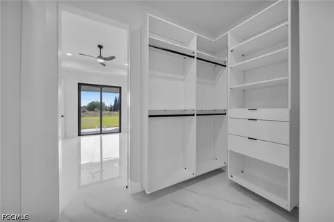 a view of an empty walk in closet