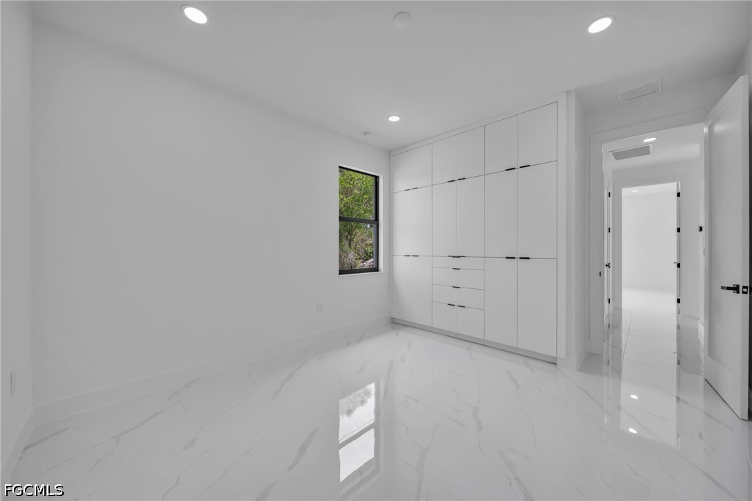1618 Moore Avenue Lehigh Acres, FL 33972 - Photo 26 of 41 a view of an empty room