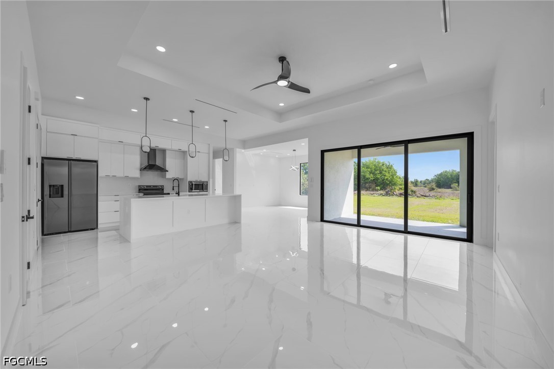 1618 Moore Avenue Lehigh Acres, FL 33972 - Photo 5 of 41 a view of a kitchen with large kitchen
