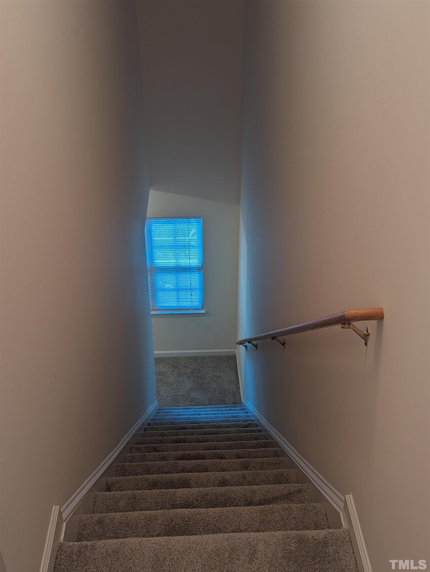 350 Plaza Drive, Unit D Chapel Hill, NC 27517 - Photo 13 of 13 a view of a livingroom with wooden floor and staircase