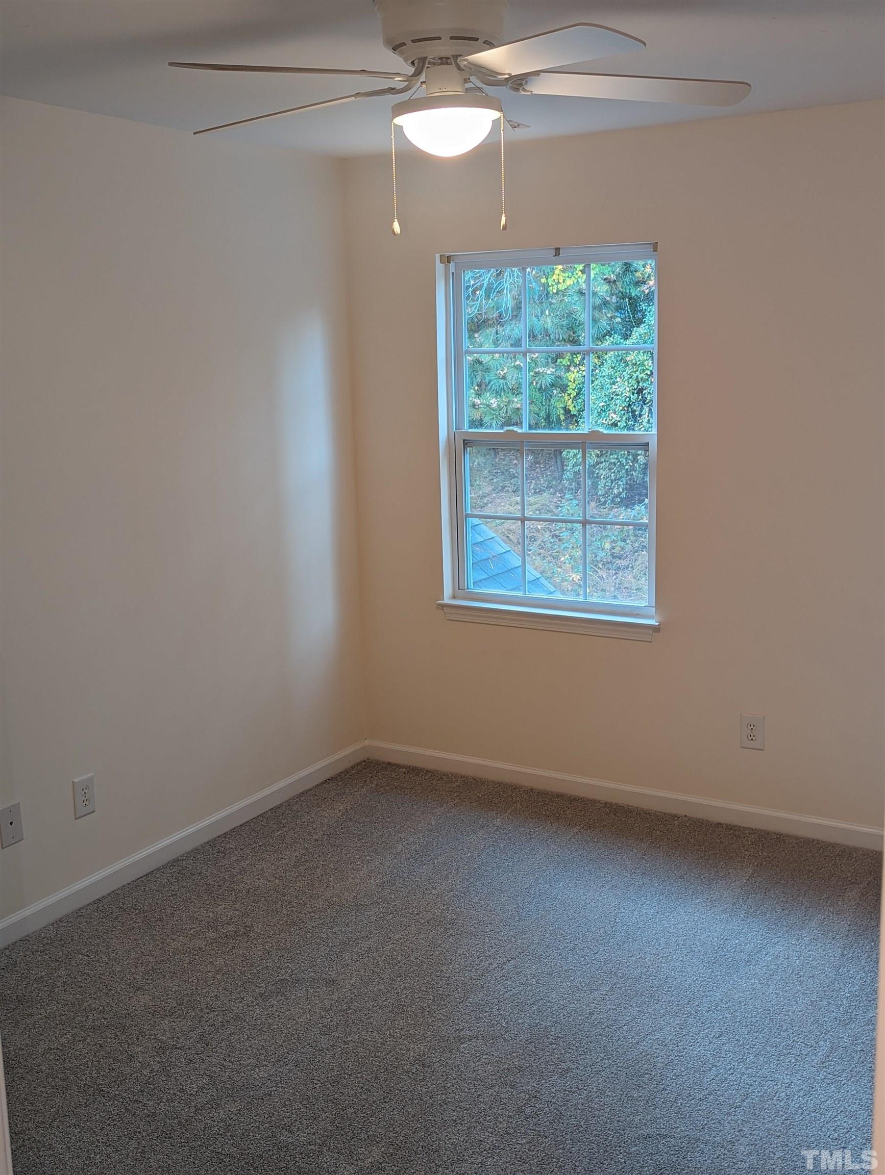 350 Plaza Drive, Unit D Chapel Hill, NC 27517 - Photo 2 of 13 an empty room with a window
