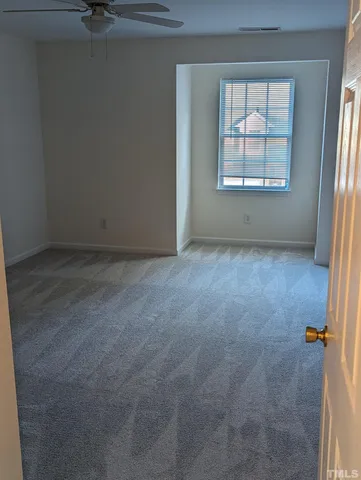 a view of a room with an empty space